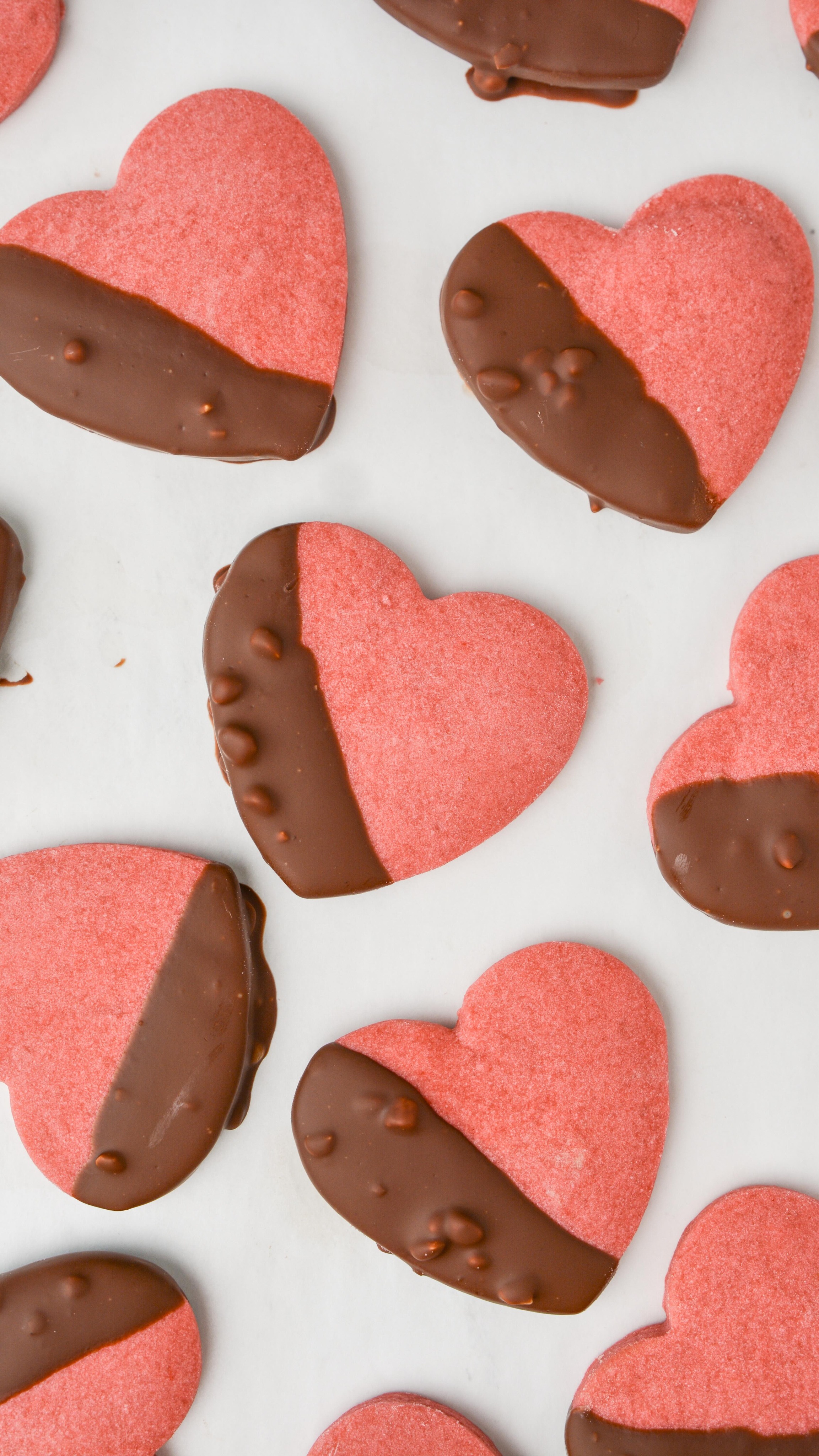 Bake these chocolate-dipped vegan shortbread cookies for Mother’s Day, made with @Zazubean’s BESTIE Almond Toffee bar 💝🍪🍫

These heart-shaped cookies are super easy to make, don’t require many ingredients, and are not-too-sweet! They’re dipped in a melted BESTIE dark chocolate bar, which has a hint of toffee flavour and chunks of almonds for a crunchy texture. 

Makes: 12-16 cookies (depending on size of cookie cutter)

Ingredients:
* ½ cup + 2 tbsp vegan butter, softened
* ¼ cup + 2 tbsp powdered sugar
* ½ tsp vanilla extract
* Pink food colouring 
* 1 ¼ cup all purpose flour
* 1 Zazubean BESTIE bar, chopped

Directions:
1. Preheat the oven to 325ºF and line a baking tray with parchment paper or a silicone baking mat.
2. In a large mixing bowl, beat the vegan butter and powdered sugar on high until smooth and fluffy. 
3. Add vanilla extract and pink food colouring and beat until the colour is evenly distributed.
4. Gradually add the flour while beating on med-low, until a crumbly texture forms. 
5. Shape the cookie dough into a disk and transfer to a cleaned and lightly floured surface.
6. Roll out the cookie dough and cut into hearts. Place on the lined baking tray.
7. Bake for 12-15 minutes. Allow the cookies to sit on the baking tray for 5 minutes before transferring to a cooling rack.
8. Melt the chopped BESTIE bar in the microwave at 30s, mix, then 20s. 
9. Dip the cooled cookies in melted BESTIE and place back on the lined baking tray to harden. 

Don’t forget to share your creation and tag us @foodbylingling @zazubean! Happy baking ☺️

-LL🤍
#Zazubean #dairyfreechocolate #mothersdaybaking #shortbreadcookies #bestofveganbaking