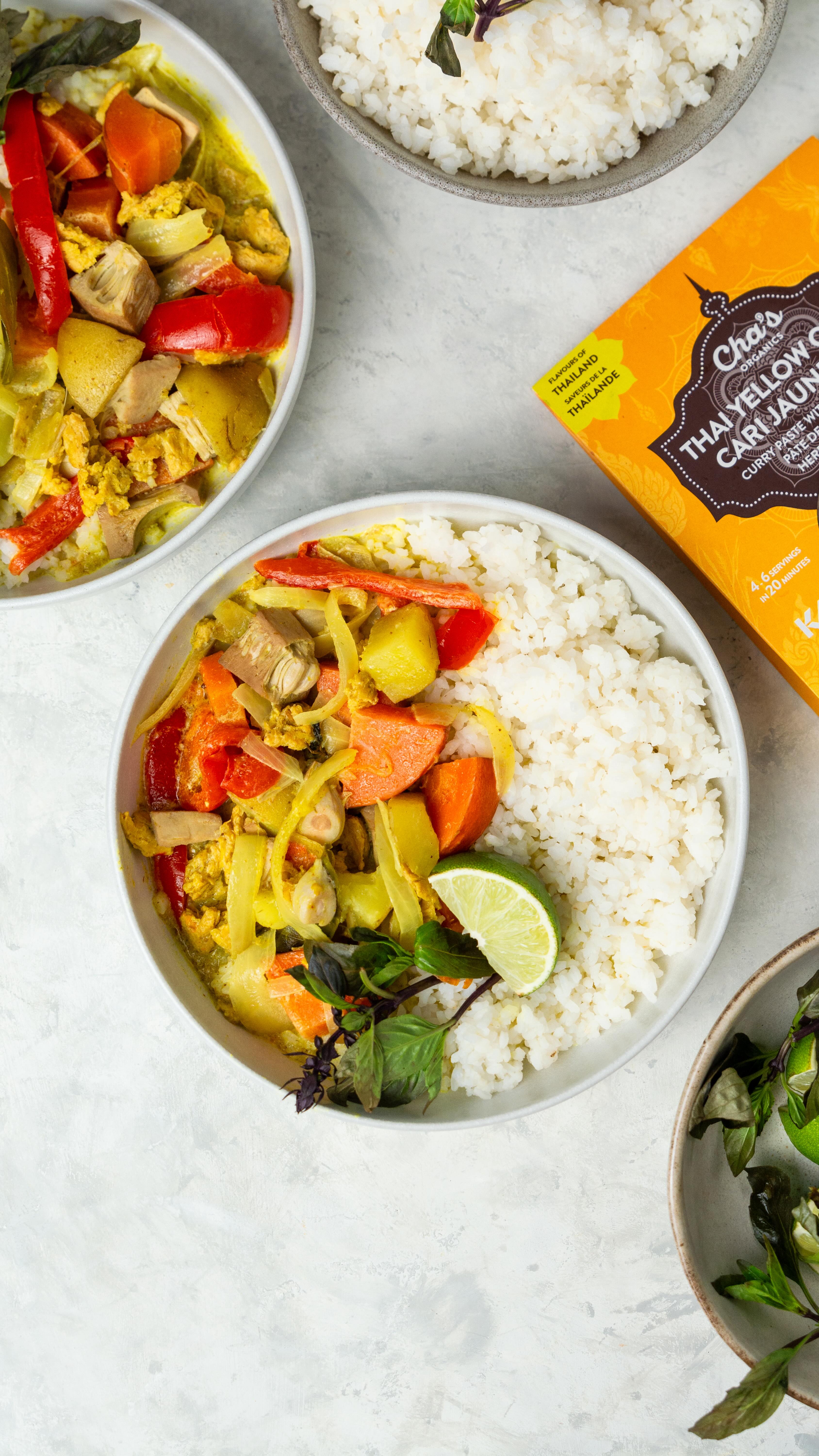 Cozy up this winter with this Jackfruit Yellow Curry recipe, made using @chasorganics Yellow Curry Kit, Young Jackfruit, and Coconut Milk! 🍛🥔🥕🌶️

This hearty curry recipe is packed with different veggies and your choice of plant protein. I’m using soy curls because they absorb flavour really well and the texture complements the shredded young jackfruit! 

Makes: 4 servings 

𝐈𝐧𝐠𝐫𝐞𝐝𝐢𝐞𝐧𝐭𝐬:
* 2 tbsp Cha’s Organics Coconut Oil
* 1 pack Cha’s Organics Thai Yellow Curry Kit
* ½ small yellow onion, sliced
* 1 yellow potato, diced
* ½ medium carrot, diced
* 1 small red bell pepper, sliced
* ½ cup dried soy curls, hydrated and drained
* ½ can Cha’s Organics Young Jackfruit, drained and shredded into pieces
* 2 cups water
* 1 can Cha’s Organics Premium Coconut Milk 
* Salt to taste
* Hint of maple syrup or coconut sugar (optional)
To serve
* 1 cup Cha’s Organics Heirloom Fragrant Rice, cooked
* Fresh Thai basil to garnish
* Lime wedges to garnish

𝐃𝐢𝐫𝐞𝐜𝐭𝐢𝐨𝐧𝐬:
1. In a large pan, heat 2 tbsp of Coconut Oil on medium heat and stir in contents of curry paste and herb pouches and sliced onions. Sautée for 2 minutes, or until fragrant.
2. Add the shredded Young Jackfruit and hydrated soy curls and sautée on high heat for 1 minute. Mix in the carrots and potatoes with a splash of water. Cover and steam for 3 minutes. Finally, add the red bell pepper. 
3. Pour in the remaining water, mix well, cover, and bring to a boil. Simmer on medium heat while stirring occasionally, with the pot half-covered, for 12-15 minutes, or until the potatoes are soft. 
4. Mix in 1 can of Premium Coconut Milk  and bring to a simmer. Add salt and sweetener to taste. 
5. Serve with warm Heirloom Fragrant Rice, fresh Thai basil, and lime wedges. 

If you try this recipe, don’t forget to share your creations and tag @foodbylingling and @chasorganics so we can see 🥰

-LL🤍
#chasorganics #yellowcurry #easyveganrecipes #jackfruitrecipe
